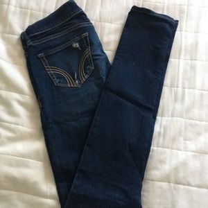 Semi distressed dark wash skinny jeans